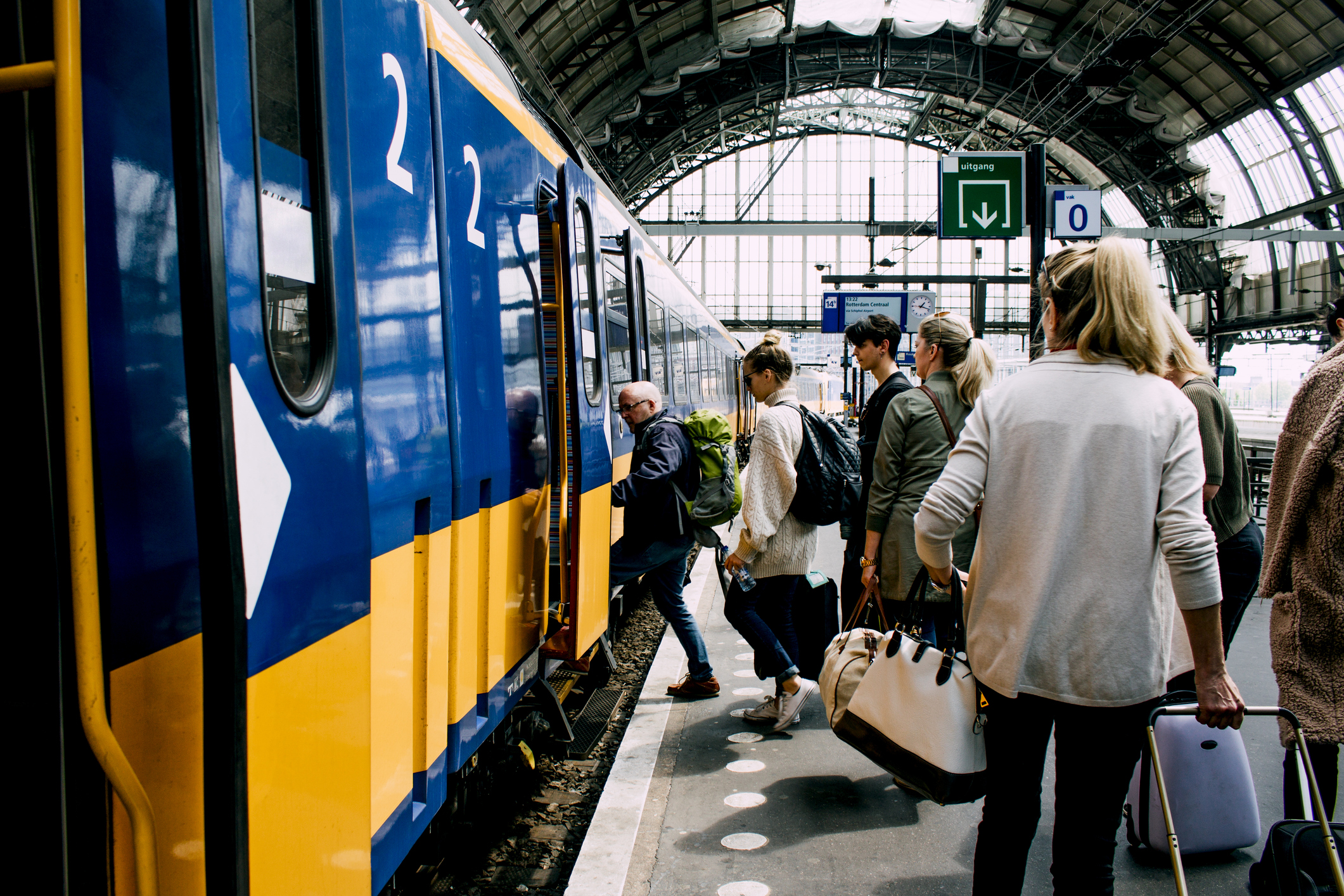train platform station people boarding train
