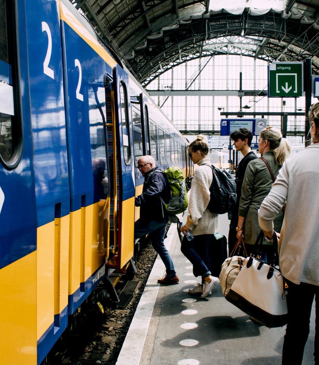 train platform station people boarding train
