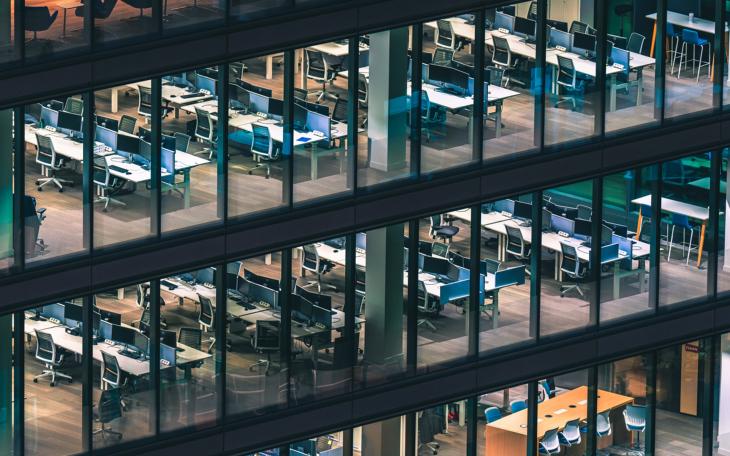 empty London office through glass window