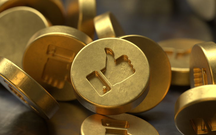gold coins with like icon engraved 