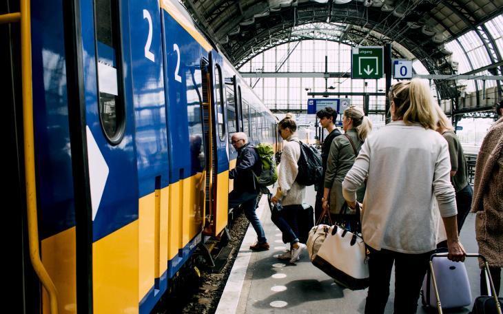 train platform station people boarding train