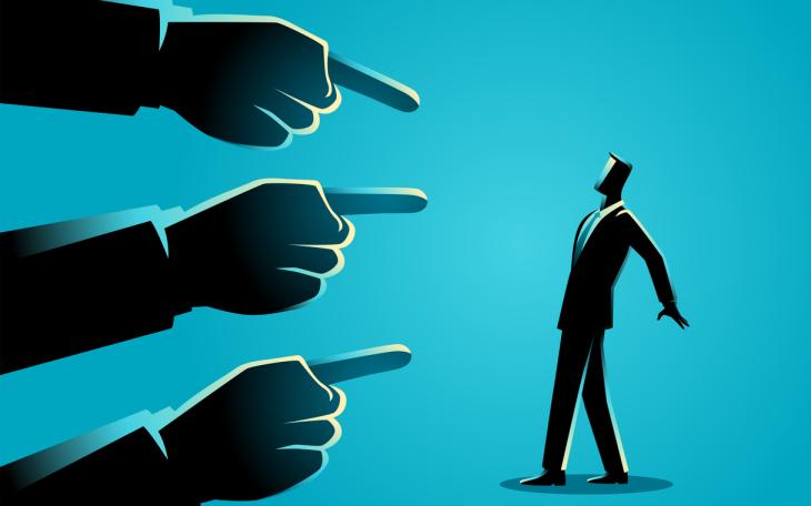 cartoon of politician being pointed at 