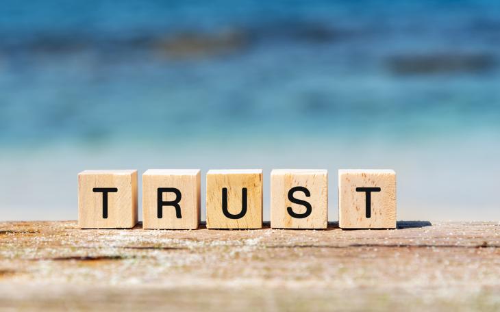 Trust building blocks on table