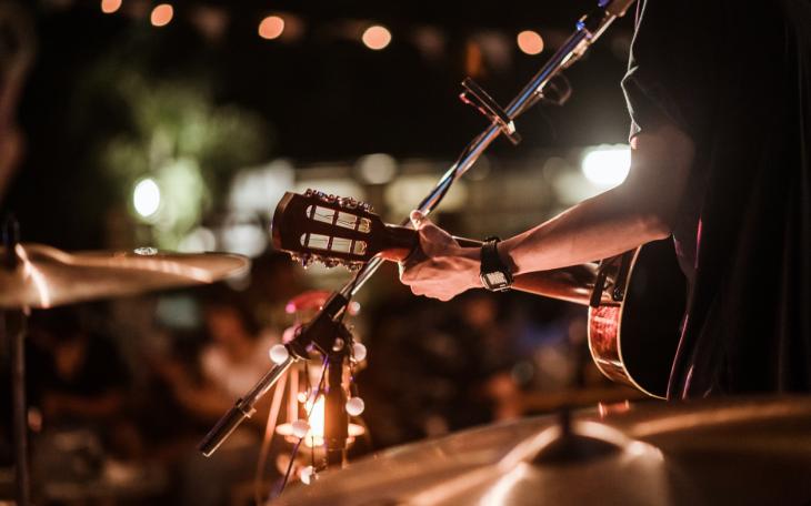 Musician playing in front of crowd
