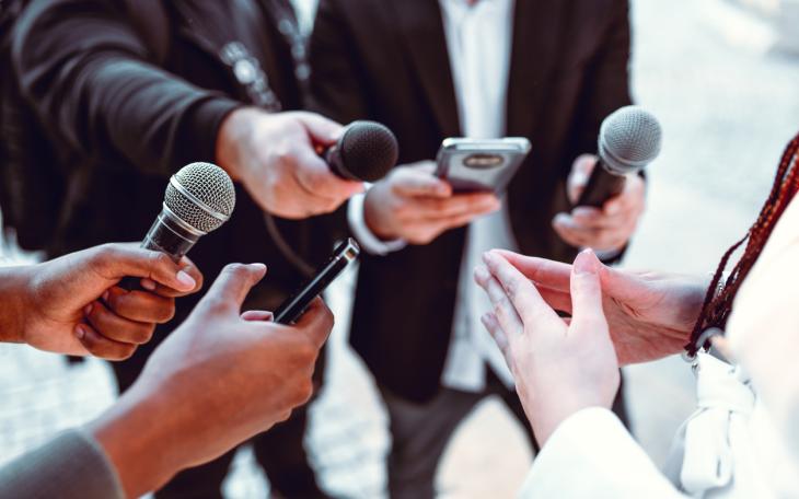 Journalist being asked questions