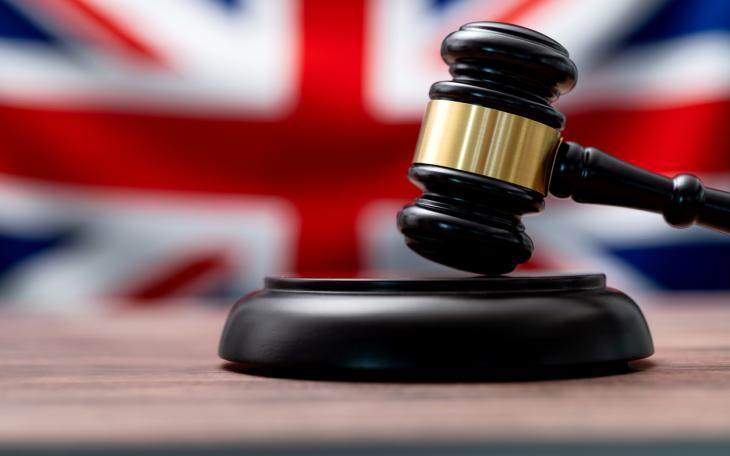 gavel behind British flag