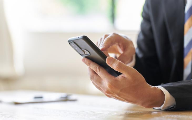 Mobile phone in man's hand 