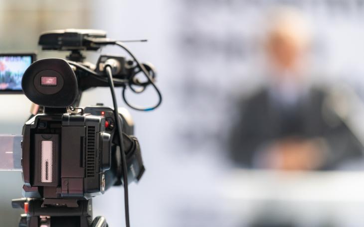 camera pointing at interviewee