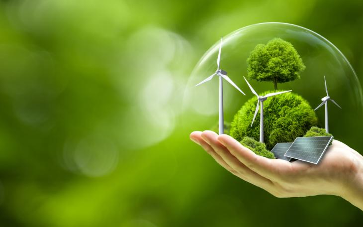 globe with renewable energy in the middle of it