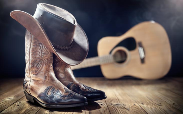 cowboy boots, hat and guitar