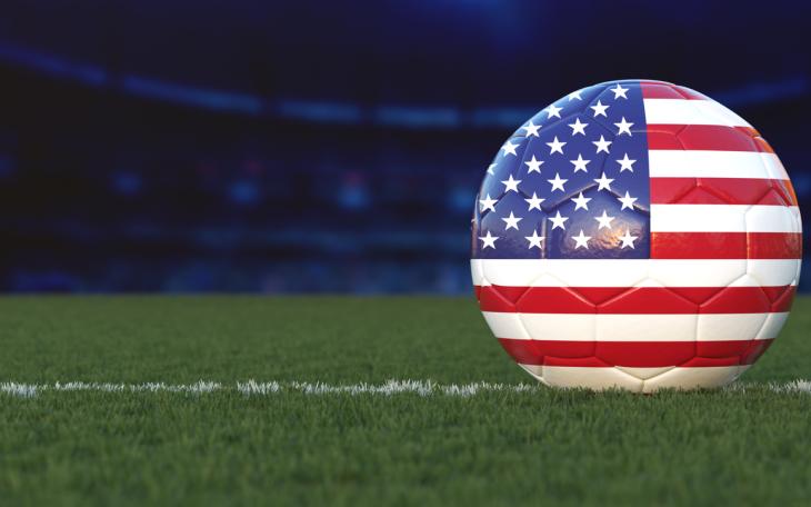 football with American flag on pitch