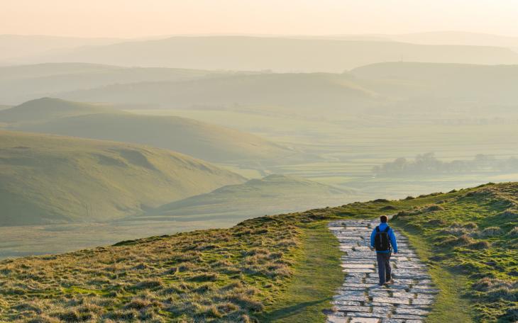 Hiker walking in Peak District