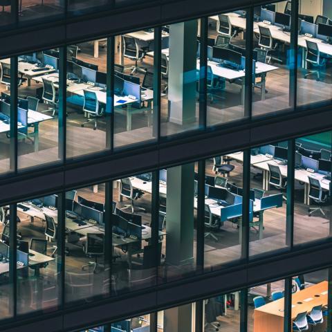 empty London office through glass window