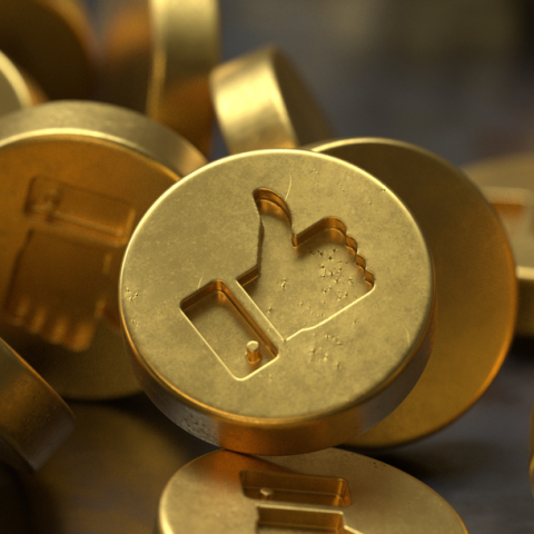 gold coins with like icon engraved 