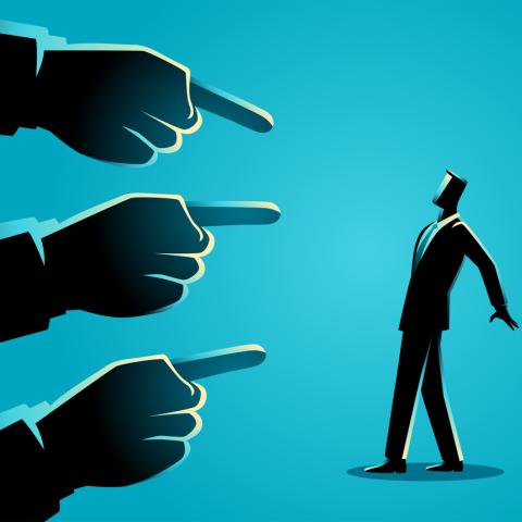 cartoon of politician being pointed at 