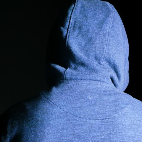 sad blue hooded man 