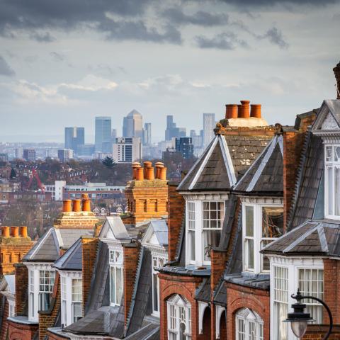 row of houses with central London in backdrop