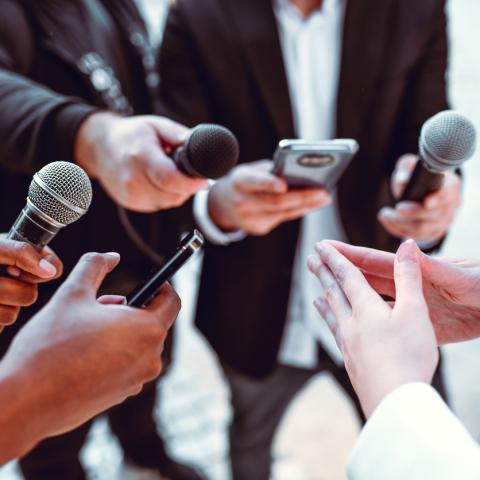 Journalist being asked questions