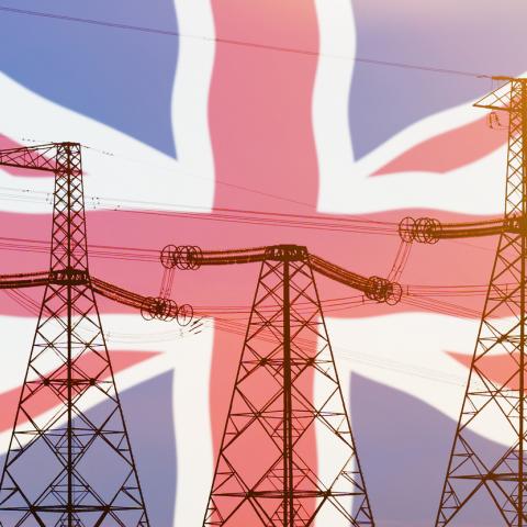 power lines with union jack flag backdrop