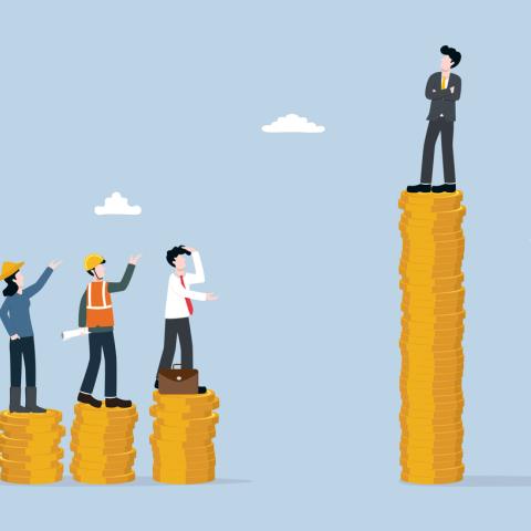 Figures on piles of money 