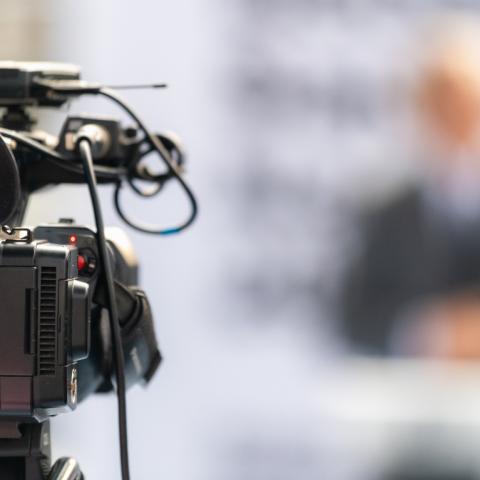 camera pointing at interviewee