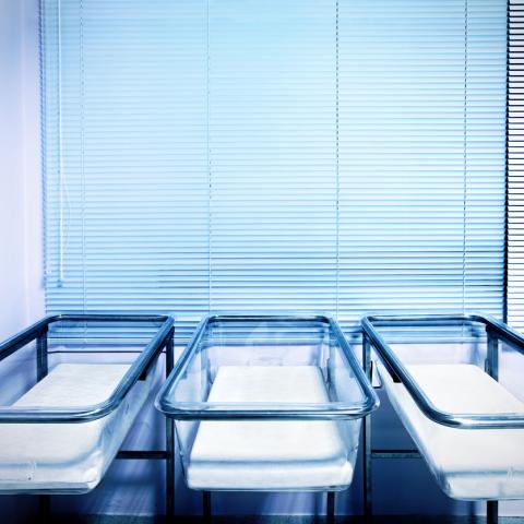 empty baby cots