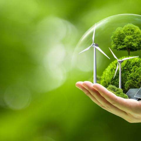 globe with renewable energy in the middle of it 