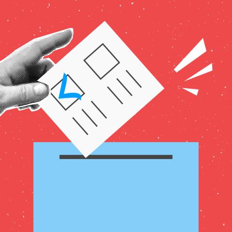 Someone sharing their vote in a ballot box