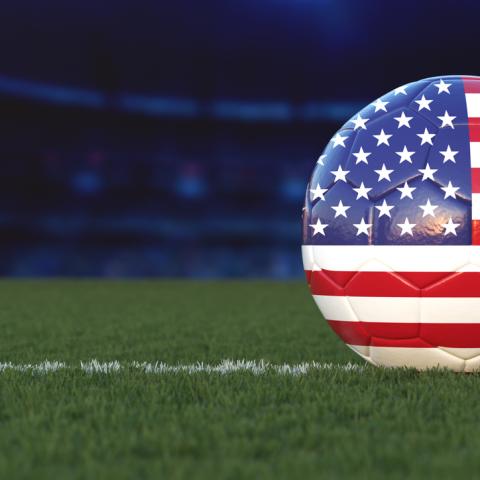 football with American flag on pitch
