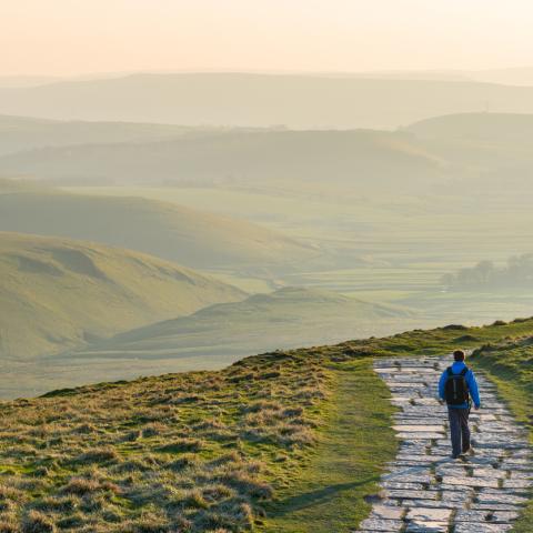 Hiker walking in Peak District