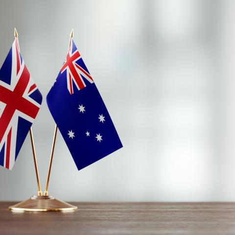 British and Australian flag on a table